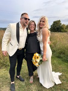 Emma J Smith wedding photographer with a smiling bride & groom